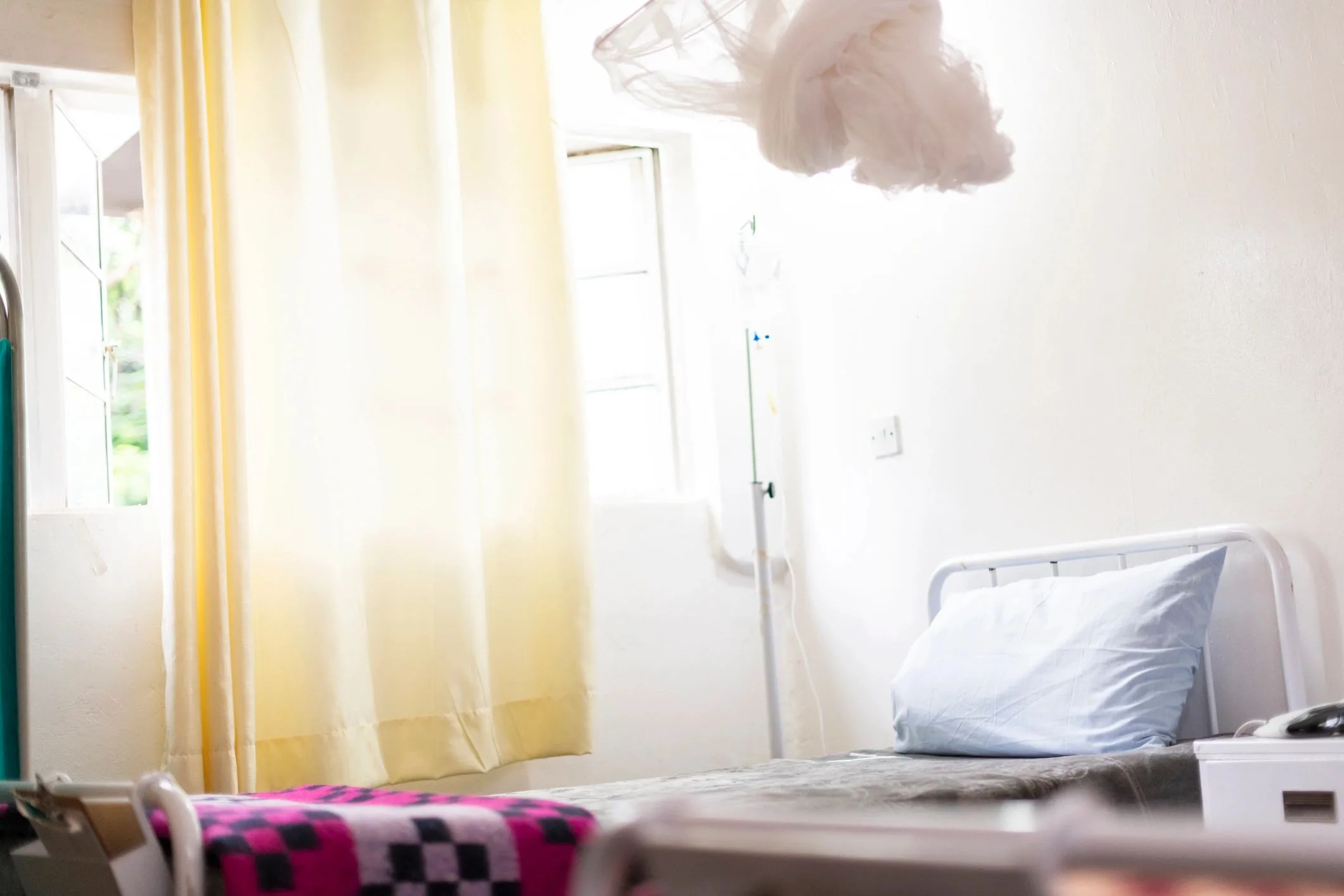 Dormitory-style room with multiple beds (representative image)